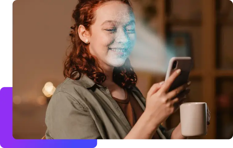 Menina ruiva olhando para celular enquanto o mesmo escaneia seu rosto